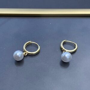 Gold hoop and pearl earrings